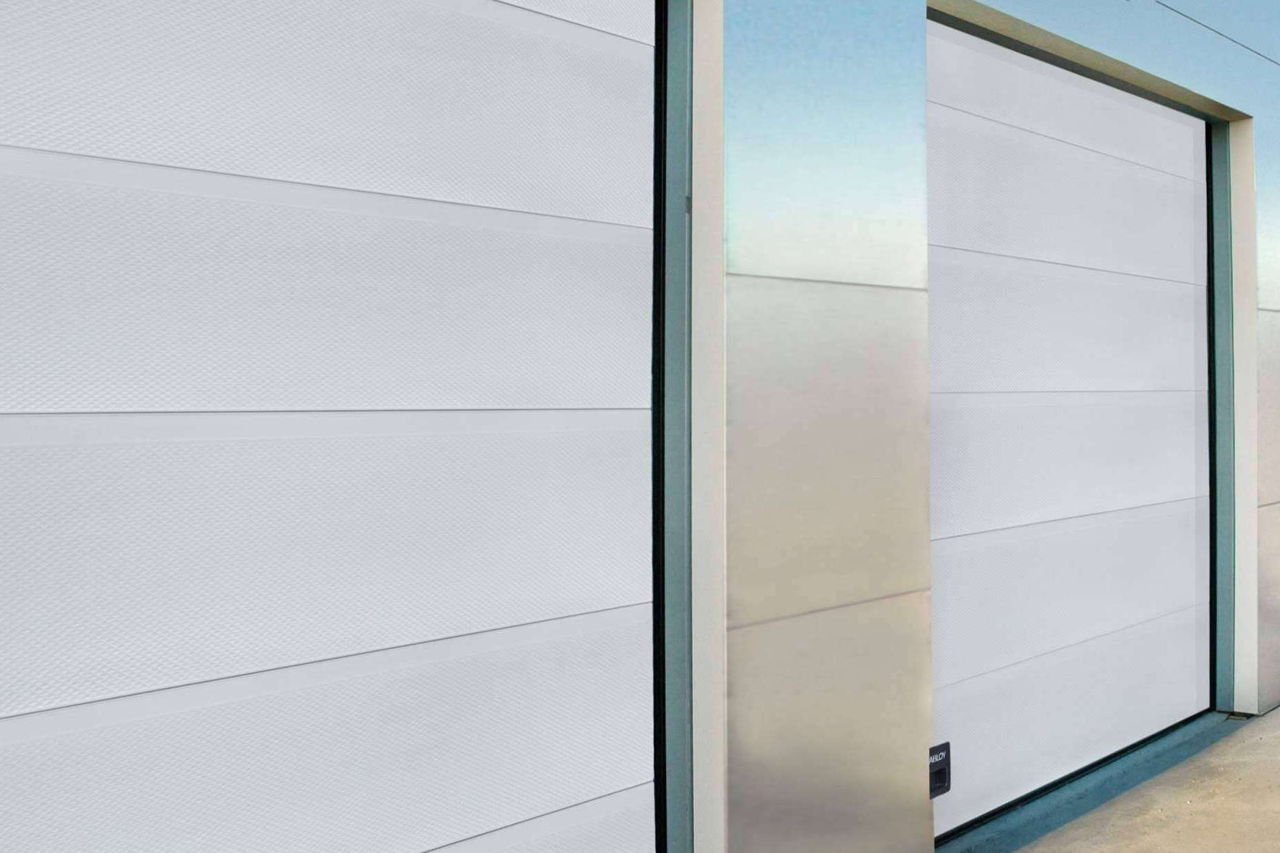 ¿Qué es una puerta seccional? ASSA ABLOY